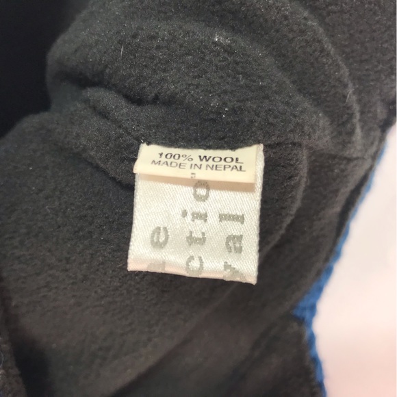 The Collection Royal 100% Wool Fleece Lined Ear Flap Tassel Knit Hat - Picture 6 of 8